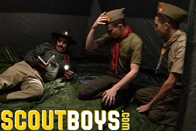 Young scouts Austin and Jack finish their evening chores and join Scoutmaster Cox in their tent. Tired from a full day adventuring out in the woods, and spending time with the other boys at camp...