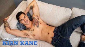 Kian Kane loves tattoos, is a total foot guy, and has great balls. He strokes his cock and plays with his ass for our camera before busting a big load.