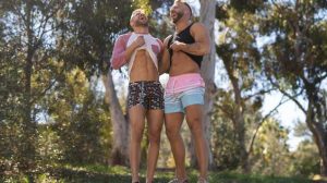 Out on the trail, bearded hunks Devy and Brogan hike up the hill, peeling off their shirts and even slipping down their shorts to grant a peek at their asses! Blond Brogan flexes, and dark-haired Devy...
