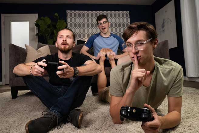 Harrison Todd gets horny while gaming with his buddy, but his friend would rather play solo than play with Harrison's joystick. As he sits on the couch, Shae Reynolds starts rubbing his shoulders