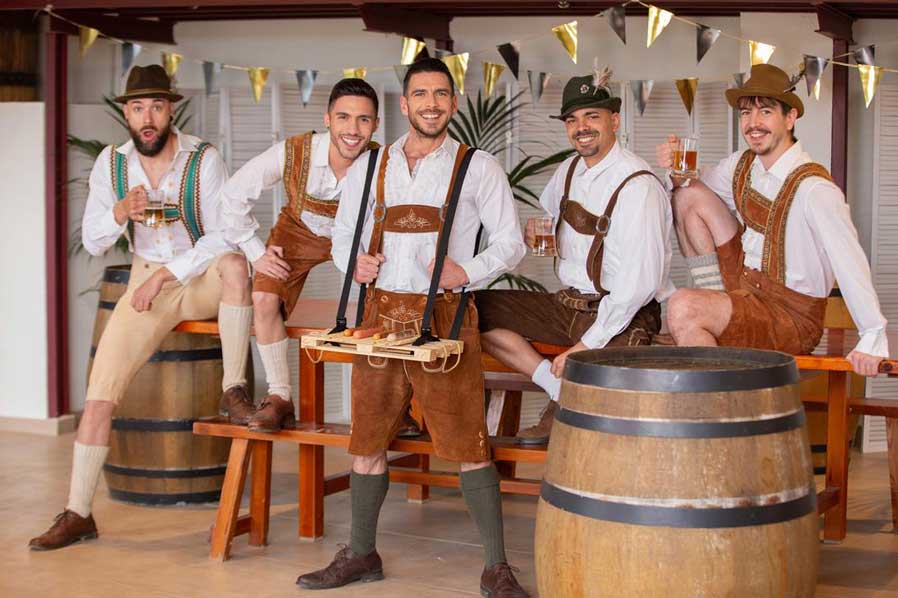 All dressed up in his lederhosen, Luciano can't wait to try everything Oktoberfest has to offer, especially the big sausages. He's suddenly even hungrier when he sees hot waiter Paddy O'Brian!